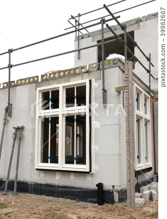 Building site with house under construction 39982687