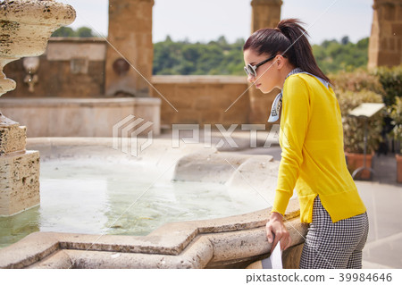 The tourist visits a small Italian town The tourist visits a small Italian town 39984646