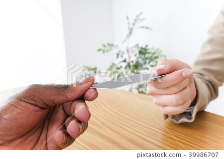 Business woman paying by card 39986707