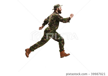 Young army soldier wearing camouflage uniform isolated on white Young army soldier wearing camouflage uniform isolated on white 39987821