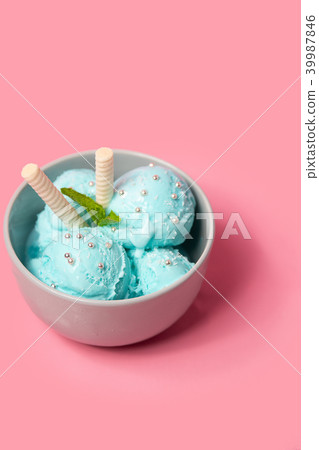 Pictachio ice cream in white bowl, copy space Pictachio ice cream in white bowl, copy space 39987846