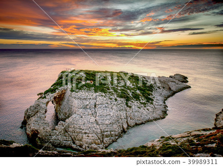 sunset over the rocks at krakonisi zakynthos 39989311