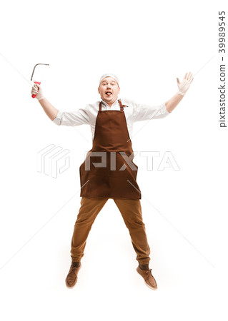 Smiling butcher posing with a cleaver isolated on white background Smiling butcher posing with a cleaver isolated on white background 39989545