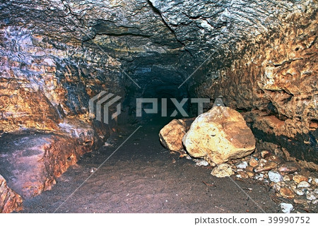 Tunnel built in soft sandstone rock. Underground Tunnel built in soft sandstone rock. Underground 39990752
