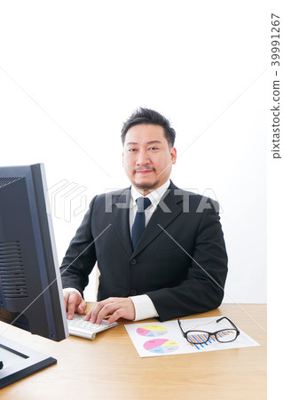 Businessman who enjoys work Businessman who enjoys work 39991267