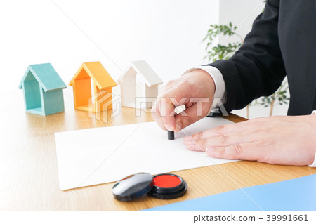 Man making a contract for real estate 39991661