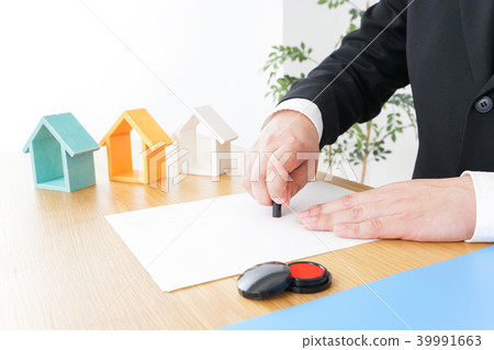 Man making a contract for real estate 39991663
