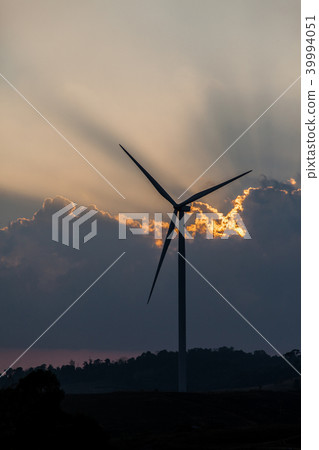 Wind turbine farm of silhouette at sunset. 39994051