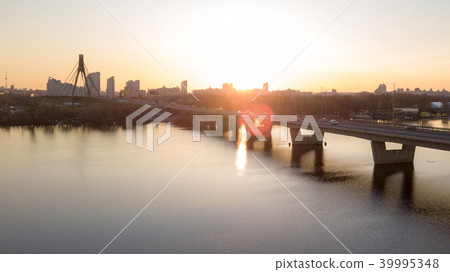 The South bridge at sunset in Kiev city, Ukraine. The South bridge at sunset in Kiev city, Ukraine. 39995348