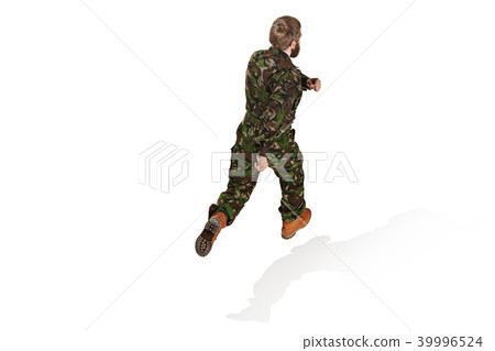 Young army soldier wearing camouflage uniform isolated on white 39996524
