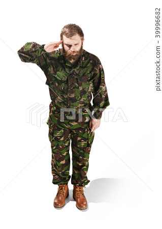 Young army soldier wearing camouflage uniform isolated on white Young army soldier wearing camouflage uniform isolated on white 39996682