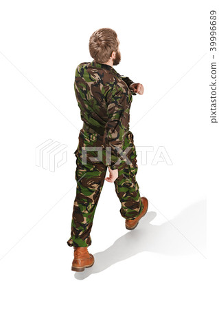 Young army soldier wearing camouflage uniform isolated on white Young army soldier wearing camouflage uniform isolated on white 39996689