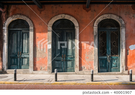 old wooden doors historic building facade 40001907