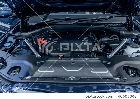 new car engine under vehicle hood new car engine under vehicle hood 40009002