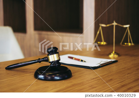 Judge gavel with Justice lawyers, object documents working on ta Judge gavel with Justice lawyers, object documents working on ta 40010329
