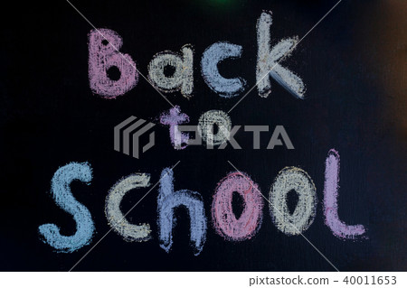 round frame with stationery flat lay on black chalkboard round frame with stationery flat lay on black chalkboard 40011653