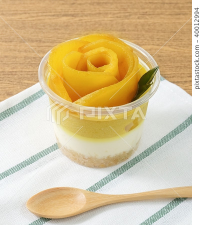 Close Up of Ripe and Sweet Mango Cheesecake Close Up of Ripe and Sweet Mango Cheesecake 40012994