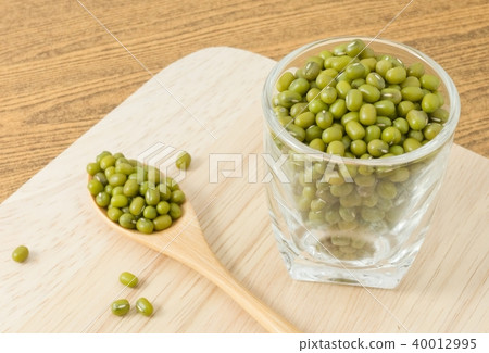Green Mung Beans in Spoon and Glass Cup Green Mung Beans in Spoon and Glass Cup 40012995