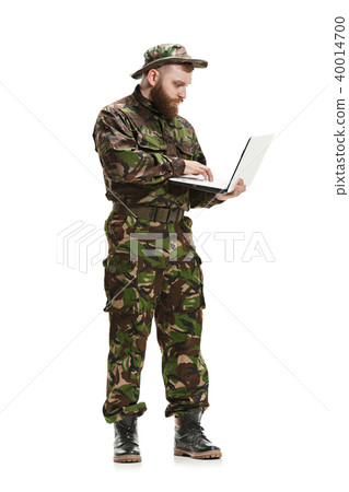 Young army soldier wearing camouflage uniform isolated on white Young army soldier wearing camouflage uniform isolated on white 40014700