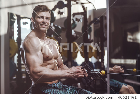 handsome strong bodybuilder men pumping up muscles handsome strong bodybuilder men pumping up muscles 40021461