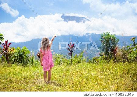 Child hiking in mountains. Kids jungle trekking. 40022349