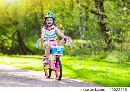 Child on bike. Kids ride bicycle. Girl cycling. Child on bike. Kids ride bicycle. Girl cycling. 40022516