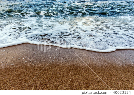 Beach and waves with dark sea that reflect sunrise Beach and waves with dark sea that reflect sunrise 40023134