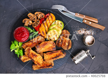 grilled vegetables and ribs 40025708