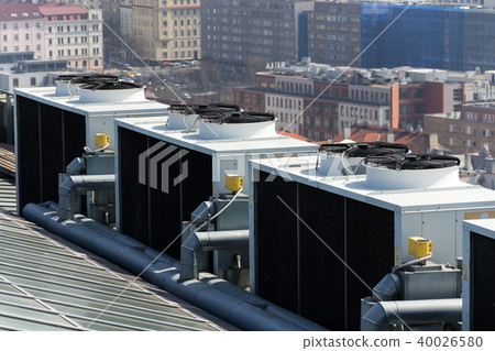 Air conditioning ventilators on roof with houses 40026580