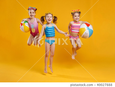 funny funny happy children jumping in swimsuit jumping on col funny funny happy children jumping in swimsuit jumping on col 40027888
