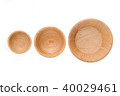 Empty wooden bowl isolated on white background 40029461