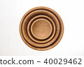 Empty wooden bowl isolated on white background 40029462