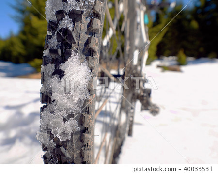 Bike in snow.Cycling on large tire wheels in snow 40033531