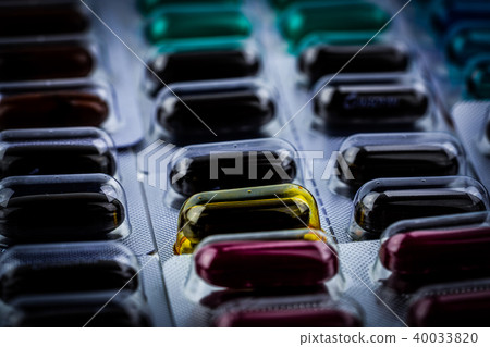 Closeup of vitamins and supplements capsule pills 40033820