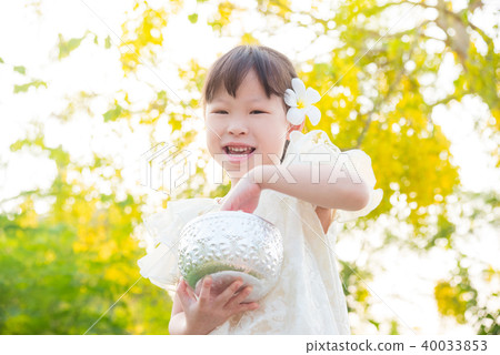 girl wearing Thai traditional dress and smiles 40033853