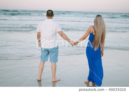beautiful family on the beach 40035020