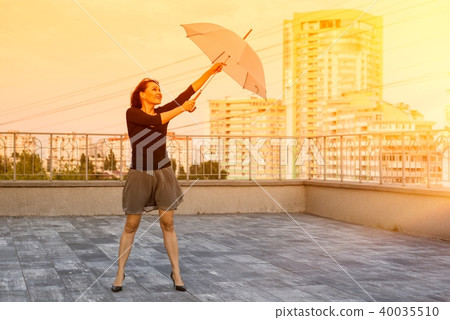 Woman with an umbrella. Woman with an umbrella. 40035510