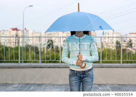 Girl under the umbrella, city style background Girl under the umbrella, city style background 40035554