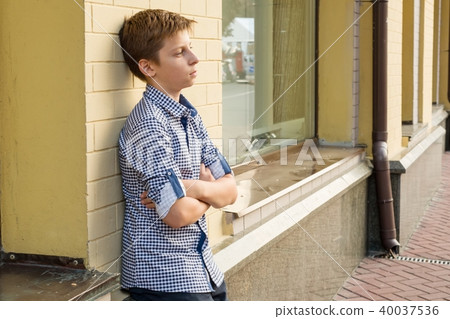 Portrait of a boy teenager 13-14 years old Portrait of a boy teenager 13-14 years old 40037536