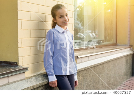 Portrait of a girl of 10-11 years old. Portrait of a girl of 10-11 years old. 40037537