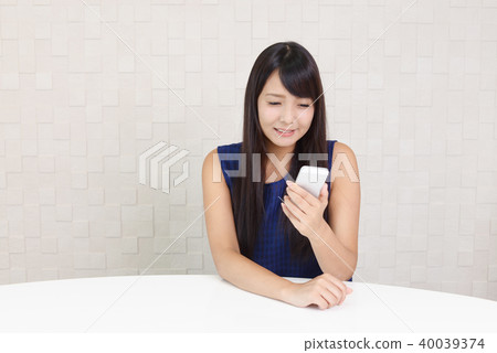 Woman with smartphone Woman with smartphone 40039374