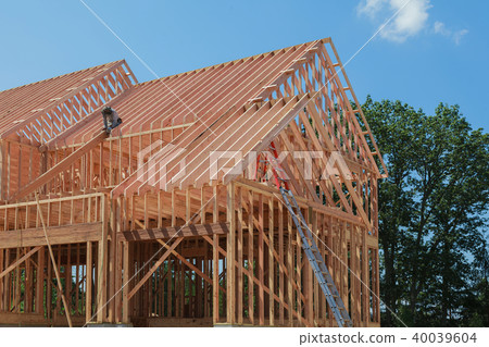 Interior framing of a new house under construction Interior framing of a new house under construction 40039604
