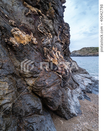 Typical sandwiched stone in Argentiera 40042798