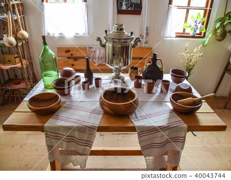 A room for food in an ethnic Cossack dwelling. Pottery, samovar and brew. A room for food in an ethnic Cossack dwelling. Pottery, samovar and brew. 40043744