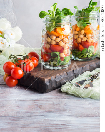 Fresh salad lunch served in mason jars Fresh salad lunch served in mason jars 40043872