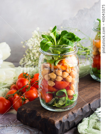 Fresh salad lunch served in mason jars Fresh salad lunch served in mason jars 40043875