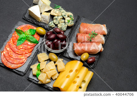 various type of italian meal or snack - cheese, sausage, olives and parma 40044706