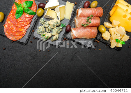 various type of italian meal or snack - cheese, sausage, olives and parma 40044711