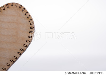 Half a Heart shaped wooden object Half a Heart shaped wooden object 40049996