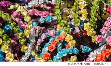 Crown made of fake colorful flowers Crown made of fake colorful flowers 40050232